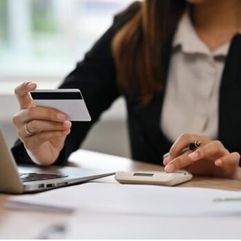 Person holding credit card