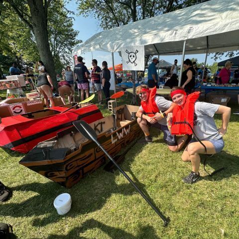 Rhegann and Addy with Cardboard Boat