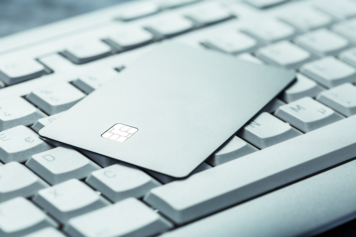 a credit card on a keyboard