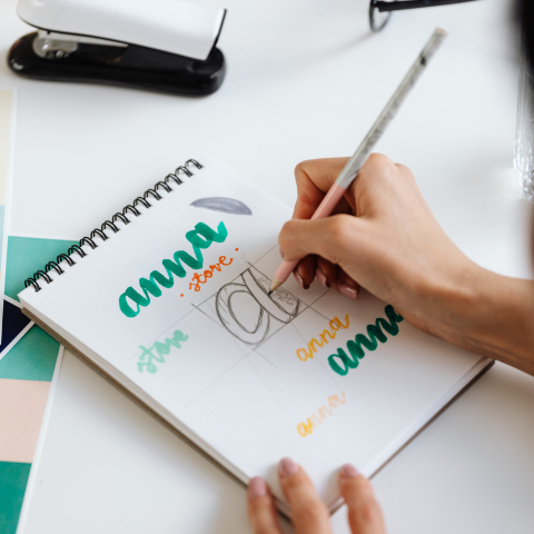 hand drawing a logo